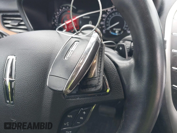 2019 Lincoln MKC Select with VIN 5LMCJ2C99KUL52725, listed as a IAAI auction lot 41512726 with 119,422 mi miles and . Bid and sale history available at DreamBid. Image 11.