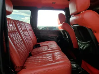 2004 Mercedes-Benz G-Class with VIN WDCYR49E54X143676, listed as a Copart auction lot 41368475 with 90,653 mi miles and Salvage Title. Bid and sale history available at carsss.com. Image 11.
