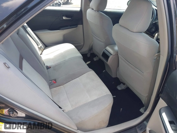 2014 Toyota Camry L with VIN 4T4BF1FKXER402857, listed as a IAAI auction lot 42144757 with 192,081 mi miles and . Bid and sale history available at DreamBid. Image 8.