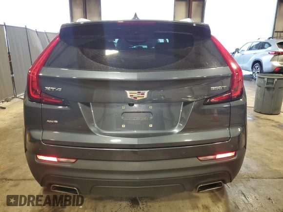 2021 Cadillac XT4 AWD Luxury with VIN 1GYFZBR49MF074936, listed as a Copart auction lot 66884034 with 38,695 mi miles and Salvage Title. Bid and sale history available at carsss.com. Image 6.