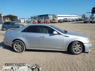 2011 Cadillac CTS Performance with VIN 1G6DJ5ED6B0128062, listed as a IAAI auction lot 42150038 with 245,293 mi miles and . Bid and sale history available at DreamBid. Image 13.