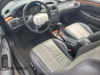 2003 Toyota Solara SE z VIN 2T1CE22PX3C026006, wystawiony jako Copart lot #56100085 z przebiegiem 181 244 mil mil oraz Szkoda całkowita • Salvage title. Historia ofert i sprzedaży dostępna na DreamBid. Obrazek 8.