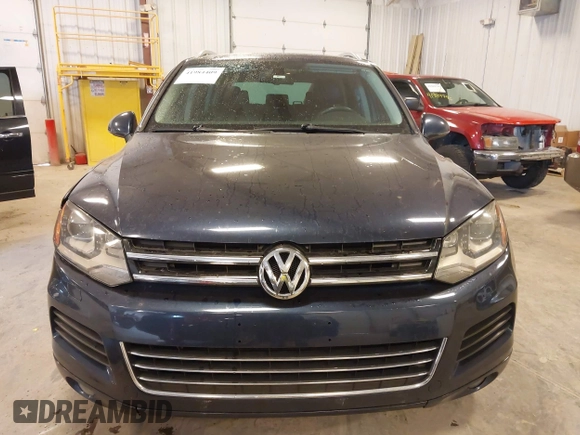 2014 Volkswagen Touareg Sport with VIN WVGEF9BP9ED008967, listed as a IAAI auction lot 41984409 with 193,859 mi miles and . Bid and sale history available at DreamBid. Image 12.