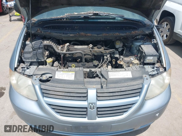 2005 Dodge Caravan SE z VIN 1D4GP24RX5B126816, wystawiony jako IAAI lot #42249235 z przebiegiem 152 638 mil mil oraz . Historia ofert i sprzedaży dostępna na DreamBid. Obrazek 10.