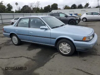 1990 Toyota Camry z VIN JT2VV22EXL3011563, wystawiony jako Copart lot #46136565 z przebiegiem 63 819 mil mil oraz Czysty tytuł • Clean title. Historia ofert i sprzedaży dostępna na DreamBid. Obrazek 4.