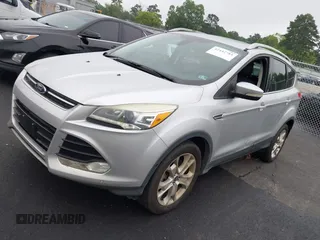 2014 Ford Escape Titanium с VIN 1FMCU0J98EUC28001, выставлен на аукционе IAAI как лот 42442784 с пробегом 163 159 миль миль и . История ставок и продаж доступна на DreamBid. Изображение 2.