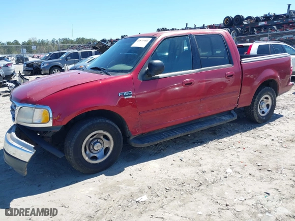 2001 Ford F-150 SuperCrew XLT with VIN 1FTRW07L11KE20412, listed as a IAAI auction lot 41877980 with 1 mi miles. Bid and sale history available at carsss.com. Image 16.
