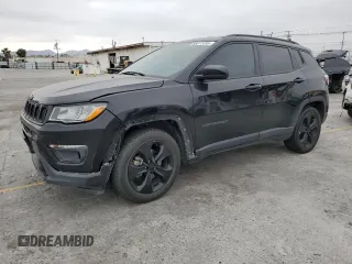 2021 Jeep Compass Altitude with VIN 3C4NJCBB2MT592285, listed as a Copart auction lot 58277495 with 76,161 mi miles and Salvage title. Bid and sale history available at DreamBid. Image 1.