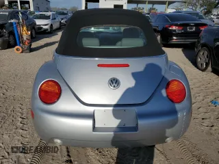 2004 Volkswagen Beetle with VIN 3VWCM21Y34M300701, listed as a Copart auction lot 77567344 with 91,236 mi miles and Salvage Title. Bid and sale history available at DreamBid. Image 6.