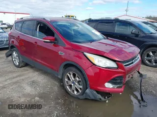 2014 Ford Escape Titanium with VIN 1FMCU9J95EUB05518, listed as a IAAI auction lot 41734025 with 188,243 mi miles. Bid and sale history available at carsss.com. Image 1.