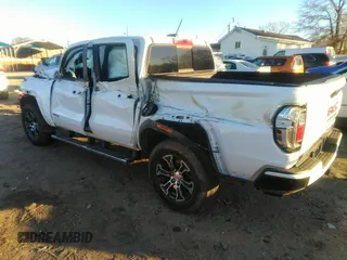 2023 GMC Canyon 4WD AT4 with VIN 1GTP6DEK0P1260420, listed as a IAAI auction lot 41864560 with 1 mi miles. Bid and sale history available at carsss.com. Image 3.