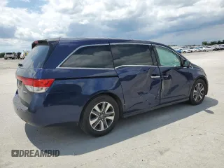 2014 Honda Odyssey Touring with VIN 5FNRL5H95EB044504, listed as a Copart auction lot 59228035 with 259,035 mi miles and Clean title. Bid and sale history available at DreamBid. Image 3.