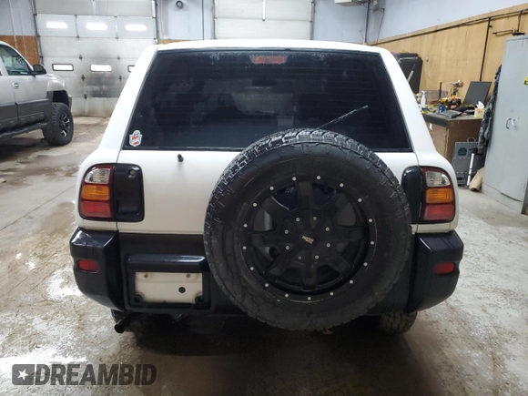 2000 Toyota RAV4 with VIN JT3GP10V2Y7070652, listed as a Copart auction lot 59151205 with 65,285 mi miles and Clean title. Bid and sale history available at DreamBid. Image 6.
