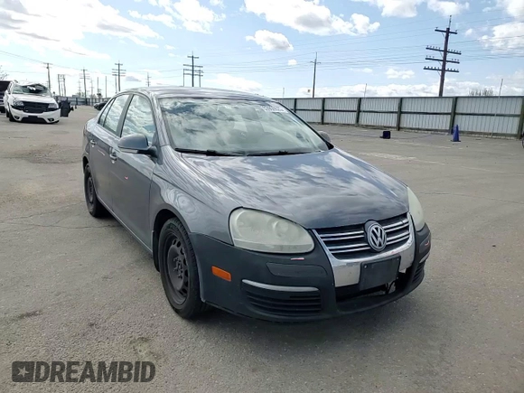 2009 Volkswagen Jetta S with VIN 3VWJM71K59M007776, listed as a Copart auction lot 53959525 with 190,557 mi miles and Salvage title. Bid and sale history available at DreamBid. Image 14.