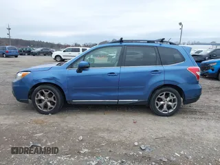 2015 Subaru Forester 2.5i Touring with VIN JF2SJAWC9FH415634, listed as a IAAI auction lot 41954673 with 140,507 mi miles. Bid and sale history available at carsss.com. Image 13.