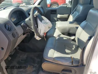 2006 Ford F-150 XL with VIN 1FTRF12W06NA22654, listed as a Copart auction lot 57064735 with 228,697 mi miles and Salvage title. Bid and sale history available at DreamBid. Image 7.