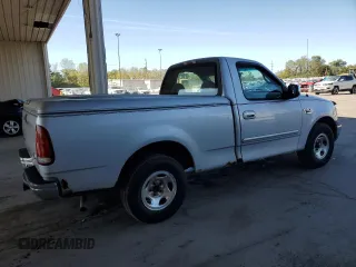 1999 Ford F-150 XL with VIN 1FTRF17L7XNA73732, listed as a Copart auction lot 74388514 with Not provided miles and Clean title. Bid and sale history available at DreamBid. Image 3.