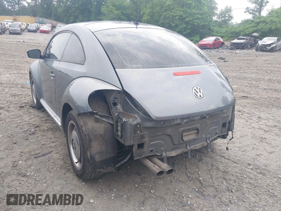 2012 Volkswagen Beetle 2.5L PZEV with VIN 3VWJP7AT2CM618436, listed as a IAAI auction lot 42297812 with 139,869 mi miles and . Bid and sale history available at DreamBid. Image 3.