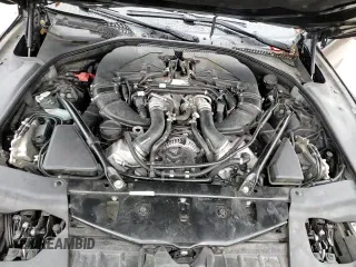 2013 BMW 6 Series 650i z VIN WBAYM9C58DDW20061, wystawiony jako Copart lot #83113314 z przebiegiem 75 500 mil mil oraz Szkoda całkowita • Salvage title. Historia ofert i sprzedaży dostępna na DreamBid. Obrazek 15.