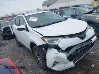 2018 Toyota RAV4 XLE with VIN JTMRFREV8JJ225065, listed as a IAAI auction lot 41940678 with 145,074 mi miles. Bid and sale history available at carsss.com. Image 1.