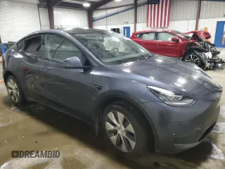 2022 Tesla Model Y Long Range with VIN 7SAYGDEE7NF422837, listed as a Copart auction lot 55271665 with 52,976 mi miles and Clean Title. Bid and sale history available at DreamBid. Image 4.
