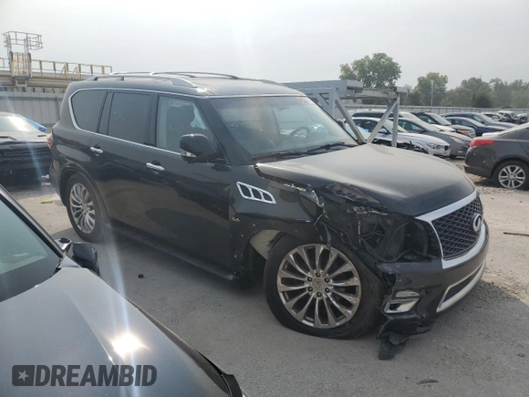 2015 Infiniti QX80 with VIN JN8AZ2NC2F9371470, listed as a Copart auction lot 70586774 with 136,169 mi miles and Salvage Title. Bid and sale history available at carsss.com. Image 4.