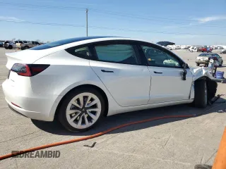 2022 Tesla Model 3 Long Range with VIN 5YJ3E1EB2NF359955, listed as a Copart auction lot 49778615 with Not Provided miles and Salvage Title. Bid and sale history available at DreamBid. Image 3.