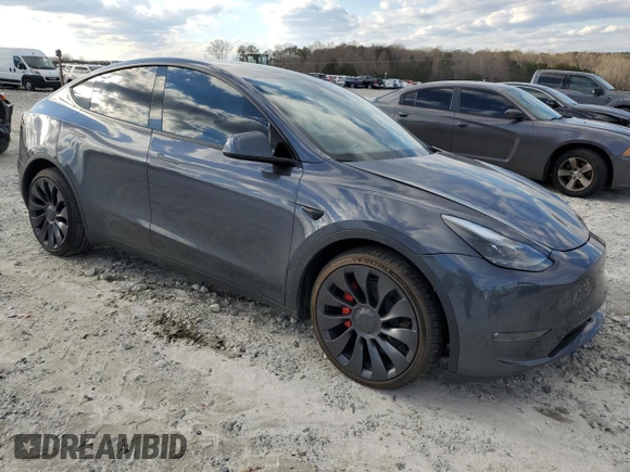 2023 Tesla Model Y Performance with VIN 7SAYGDEF4PF920859, listed as a Copart auction lot 89136705 with 8,148 mi miles and Salvage Title. Bid and sale history available at DreamBid. Image 4.