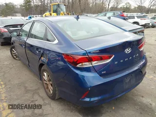 2019 Hyundai Sonata SE with VIN 5NPE24AF0KH737313, listed as a IAAI auction lot 41618811 with 104,822 mi miles and . Bid and sale history available at carsss.com. Image 3.