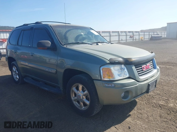 2003 GMC Envoy SLT with VIN 1GKDT13S932373739, listed as a IAAI auction lot 42122017 with 155,963 mi miles. Bid and sale history available at carsss.com. Image 1.