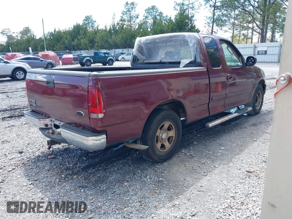 2003 Ford F-150 XL with VIN 1FTRX17203KA95359, listed as a IAAI auction lot 41891118 with 206,393 mi miles. Bid and sale history available at carsss.com. Image 4.