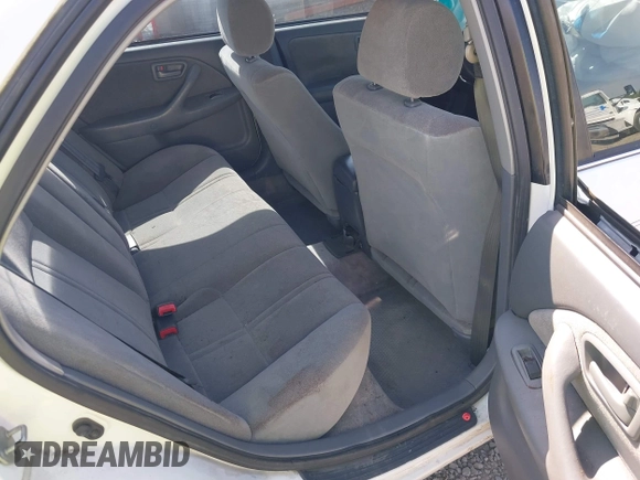 1999 Toyota Camry LE z VIN 4T1BG22K0XU862535, wystawiony jako IAAI lot #42116856 z przebiegiem 186 094 mil mil oraz . Historia ofert i sprzedaży dostępna na DreamBid. Obrazek 8.