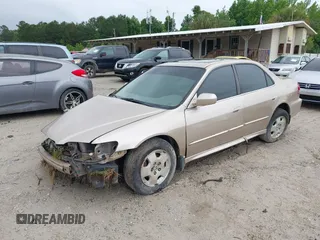 2001 Honda Accord EX z VIN 1HGCG16561A080094, wystawiony jako IAAI lot #42230752 z przebiegiem 246 469 mil mil oraz . Historia ofert i sprzedaży dostępna na DreamBid. Obrazek 2.