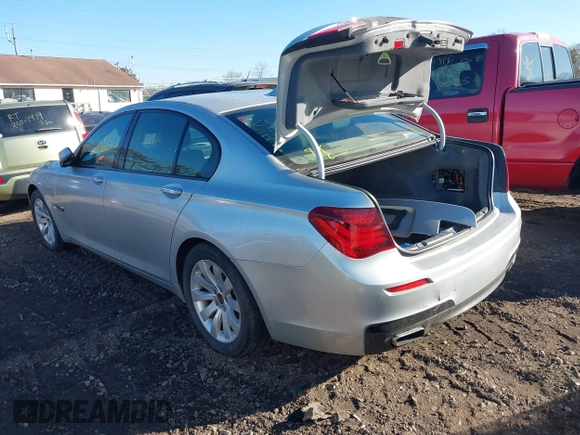 2014 BMW 7 Series 740i with VIN WBAYA6C54ED144450, listed as a IAAI auction lot 41680060 with 999,999 mi miles. Bid and sale history available at carsss.com. Image 3.
