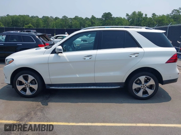 2018 Mercedes-Benz GLE 350 with VIN 4JGDA5HB6JB012687, listed as a IAAI auction lot 42389978 with 112,811 mi miles and . Bid and sale history available at DreamBid. Image 14.