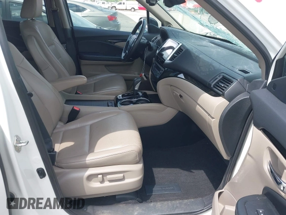 2019 Honda Ridgeline RTL-E with VIN 5FPYK3F77KB021667, listed as a IAAI auction lot 42115019 with 87,221 mi miles and . Bid and sale history available at DreamBid. Image 5.