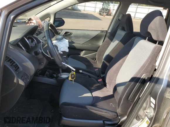 2007 Honda Fit Sport with VIN JHMGD38647S006667, listed as a Copart auction lot 71490344 with 140,402 mi miles and Salvage Title. Bid and sale history available at carsss.com. Image 7.