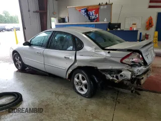 2005 Ford Taurus SE with VIN 1FAFP53215A133518, listed as a Copart auction lot 59615205 with 127,778 mi miles and Salvage title. Bid and sale history available at DreamBid. Image 2.