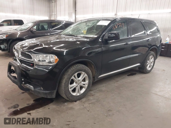 2013 Dodge Durango SXT with VIN 1C4RDJAG0DC512293, listed as a IAAI auction lot 41875919 with 191,128 mi miles and . Bid and sale history available at DreamBid. Image 18.