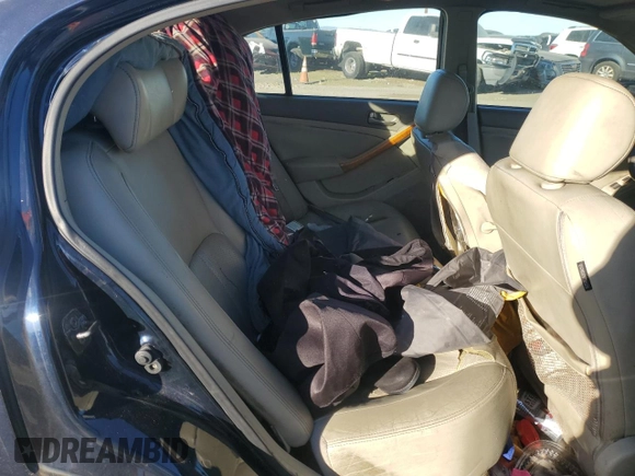 2003 Infiniti G35 w/Leather z VIN JNKCV51E23M015424, wystawiony jako Copart lot #87714105 z przebiegiem 174 773 mil mil oraz Szkoda całkowita • Salvage title. Historia ofert i sprzedaży dostępna na DreamBid. Obrazek 10.