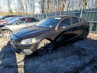 2017 Volvo S60 Dynamic with VIN YV140MTL7H2433873, listed as a Copart auction lot 82117074 with 85,667 mi miles and Salvage Title. Bid and sale history available at carsss.com. Image 1.