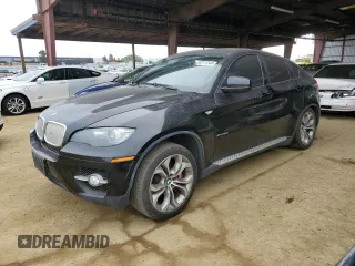 2011 BMW X6 50i with VIN 5UXFG8C56BLZ96125, listed as a Copart auction lot 84271244 with 69,732 mi miles and Salvage Title. Bid and sale history available at carsss.com. Image 1.