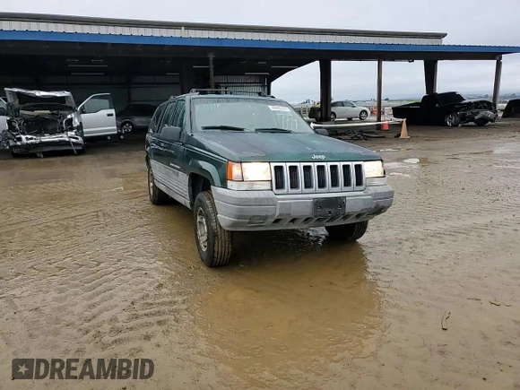 1997 Jeep Grand Cherokee TSi with VIN 1J4FX58S6VC602782, listed as a Copart auction lot 86605074 with 158,971 mi miles and Salvage Title. Bid and sale history available at carsss.com. Image 12.