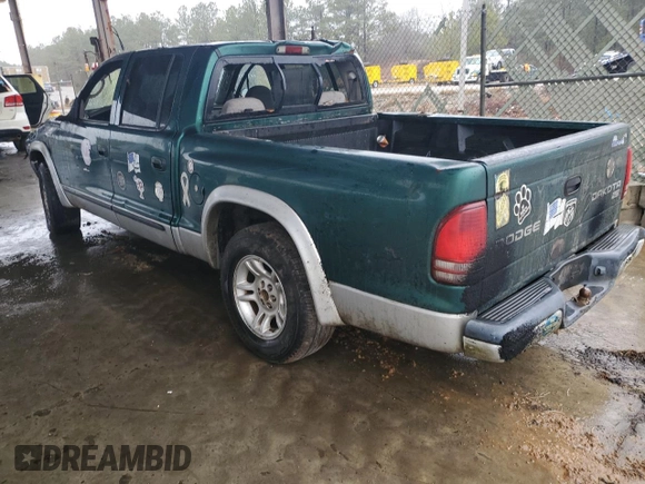 2003 Dodge Dakota SLT with VIN 1D7HL48X03S261436, listed as a Copart auction lot 42317965 with 136,380 mi miles and Salvage Title. Bid and sale history available at carsss.com. Image 2.