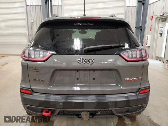 2019 Jeep Cherokee Trailhawk с VIN 1C4PJMBX7KD426213, выставлен на аукционе Copart как лот 54957065 с пробегом 46 066 миль миль и Списание • Salvage title. История ставок и продаж доступна на DreamBid. Изображение 6.