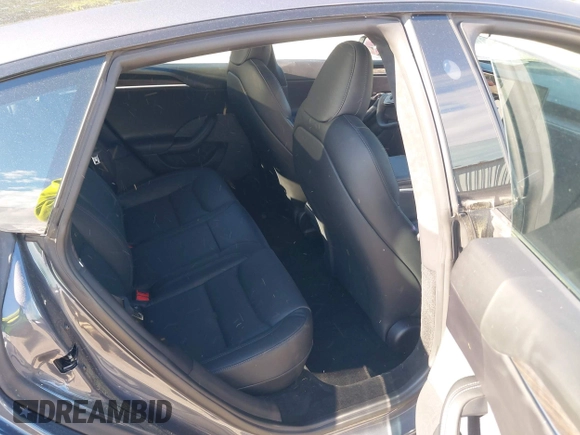 2022 Tesla Model S with VIN 5YJSA1E57NF479056, listed as a IAAI auction lot 42091009 with 78,272 mi miles and . Bid and sale history available at DreamBid. Image 8.