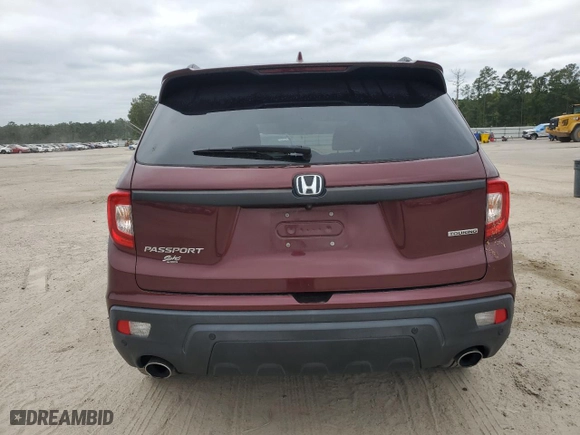 2020 Honda Passport Touring with VIN 5FNYF7H94LB001817, listed as a Copart auction lot 69430964 with 63,147 mi miles and Salvage Title. Bid and sale history available at carsss.com. Image 6.
