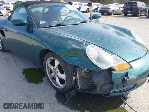 2001 Porsche Boxster z VIN WP0CA29831U623833, wystawiony jako IAAI lot #42075731 z przebiegiem 69 922 mil mil oraz . Historia ofert i sprzedaży dostępna na DreamBid. Obrazek 6.