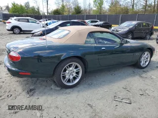 2002 Jaguar XK with VIN SAJDA42C22NA23724, listed as a Copart auction lot 53521005 with 61,468 mi miles and Salvage Title. Bid and sale history available at DreamBid. Image 3.