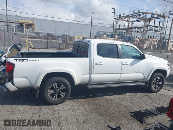 2018 Toyota Tacoma SR5 with VIN 3TMBZ5DN7JM016650, listed as a IAAI auction lot 41903835 with 105,123 mi miles and . Bid and sale history available at DreamBid. Image 14.